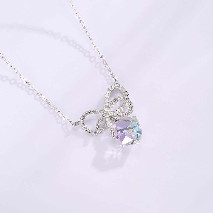 Elegance in Crystal Bows Earrings and Necklace Set