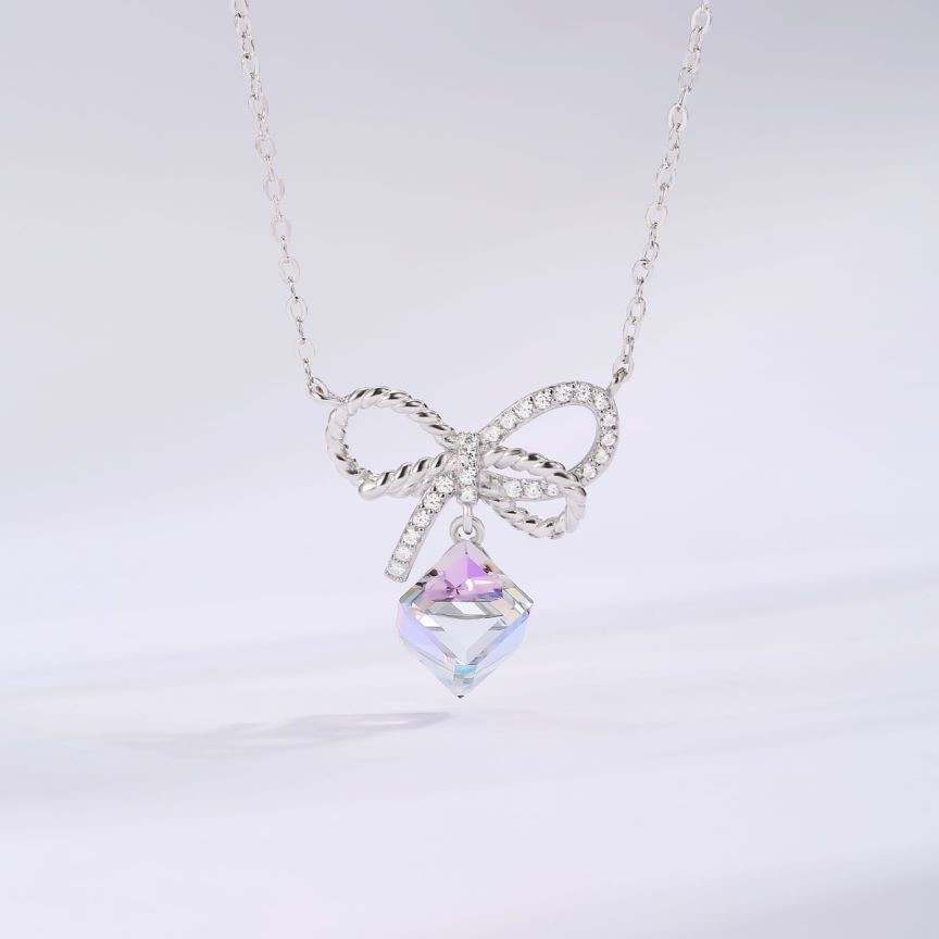 Elegance in Crystal Bows Earrings and Necklace Set