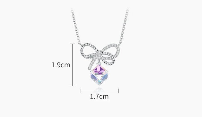 Elegance in Crystal Bows Earrings and Necklace Set