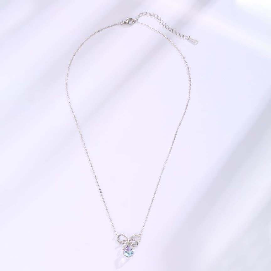 Elegance in Crystal Bows Earrings and Necklace Set